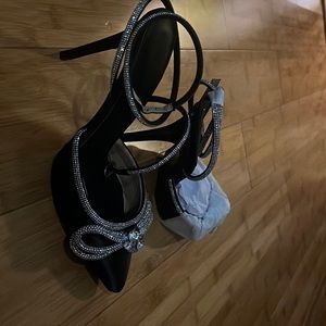 Beautiful black close toed heels with silver gem bow